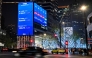 A screen showing the Shanghai composite index (top), Shenzhen component index (C) and Beijing stock exchange 50 index (bottom) is seen in Jing'an district in Shanghai on April 9, 2025. Photo by Hector RETAMAL / AFP