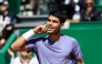 Spain's Carlos Alcaraz reacts after a point as he plays against Germany's Daniel Altmaier during the Monte Carlo ATP Masters Series Tournament round of 16 tennis match on the Ranier III court at the Monte Carlo Country Club in Roquebrune-Cap-Martin on April 10, 2025. (Photo by Valery HACHE / AFP)