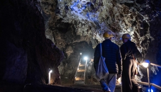 Wits University students walk up a flight of stairs at the Sterkfontein caves located within the Cradle of Humankind UNESCO World Heritage Site in Krugersdorp near Johannesburg on April 15, 2025. (Photo by Emmanuel Croset / AFP)