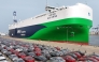 Chinese-made MG cars wait to be loaded onto the newly commissioned and Chinese-built 7,800-car LNG dual-fuel car carrier 