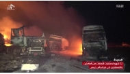 This grab taken from footage released by al-Masirah TV station of Yemen's Huthis shows fire and destruction at the site of US strikes on the Ras Issa fuel port in western Yemen on April 18, 2025. Photo by AL-MASIRAH TV / AFP.
