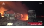 This grab taken from footage released by al-Masirah TV station of Yemen's Huthis shows fire and destruction at the site of US strikes on the Ras Issa fuel port in western Yemen on April 18, 2025. Photo by AL-MASIRAH TV / AFP.
