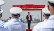 US Vice President JD Vance (C) gestures as the American national anthem is played ahead of inspecting a guard of honour upon his arrival at the airport in New Delhi on April 21, 2025. Photo by Kenny HOLSTON / POOL / AFP