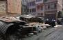 This photograph taken on April 16, 2025 shows remains of the 2015 earthquake, at a residential colony in Bhaktapur on the outskirts of Kathmandu. (Photo by Prakash Mathema / AFP) 