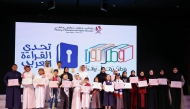 Undersecretary of the MoEHE H E Ibrahim bin Saleh Al Nuaimi pose with students as the Ministry of Education and Higher Education concluded the 6th edition of the Reading Olympiad and the 9th season of the Arab Reading Challenge.

