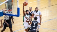 Action during the Group A game between Al Ahli and Al Sadd.