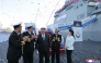 This picture taken on April 25, 2025 and released from North Korea's official Korean Central News Agency (KCNA) on April 26, 2025 shows North Korean leader Kim Jong Un (C) and his daughter Ju Ae (R) attending the launch ceremony of a newly-built destroyer at the Nampo port in Nampo. (Photo by KCNA VIA KNS / AFP)