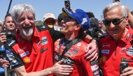 Ducati Lenovo Team's Spanish rider Marc Marquez (C) celebrates after winning the the MotoGP Spanish Grand Prix Sprint race at the Jerez racetrack in Jerez de la Frontera, on April 26, 2025. (Photo by JORGE GUERRERO / AFP)
