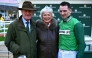 Trainer Willie Mullins (L) poses for a photograph with his wife Jackie and his son jockey Patrick Mullins, after his 100th win with Jasmin De Vaux winning the Champion Bumper race on the second day of the Cheltenham Festival at Cheltenham Racecourse, in Cheltenham, western England on March 13, 2024. (Photo by Ben Stansall / AFP)

