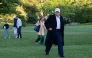 US President Donald Trump walks toward the press after arriving on the South Lawn of the White House in Washington, DC, on April 27, 2025. (Photo by Annabelle Gordon / AFP)