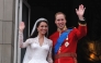 Britain's Prince William and his wife Kate, Duchess of Cambridge, wave to the crowd from the balcony of Buckingham Palace in London on April 29, 2011, following their wedding. (Photo by John Stillwell / POOL / AFP)
