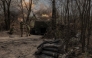 Ukrainian servicemen of the Skala regiment artillery unit fire an M109 howitzer toward Russian positions, in an undisclosed area, in the eastern Donetsk region, on April 23, 2025. (Photo by Roman Pilipey / AFP)