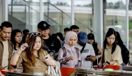 Passengers transfer at Padalarang Station of the Jakarta-Bandung High-Speed Railway in Padalarang, Indonesia, March 29, 2025. (Photo by Septianjar Muharam/Xinhua)

