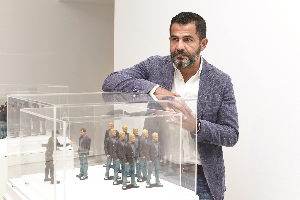 Mahmoud Obaidi with his collections. 
