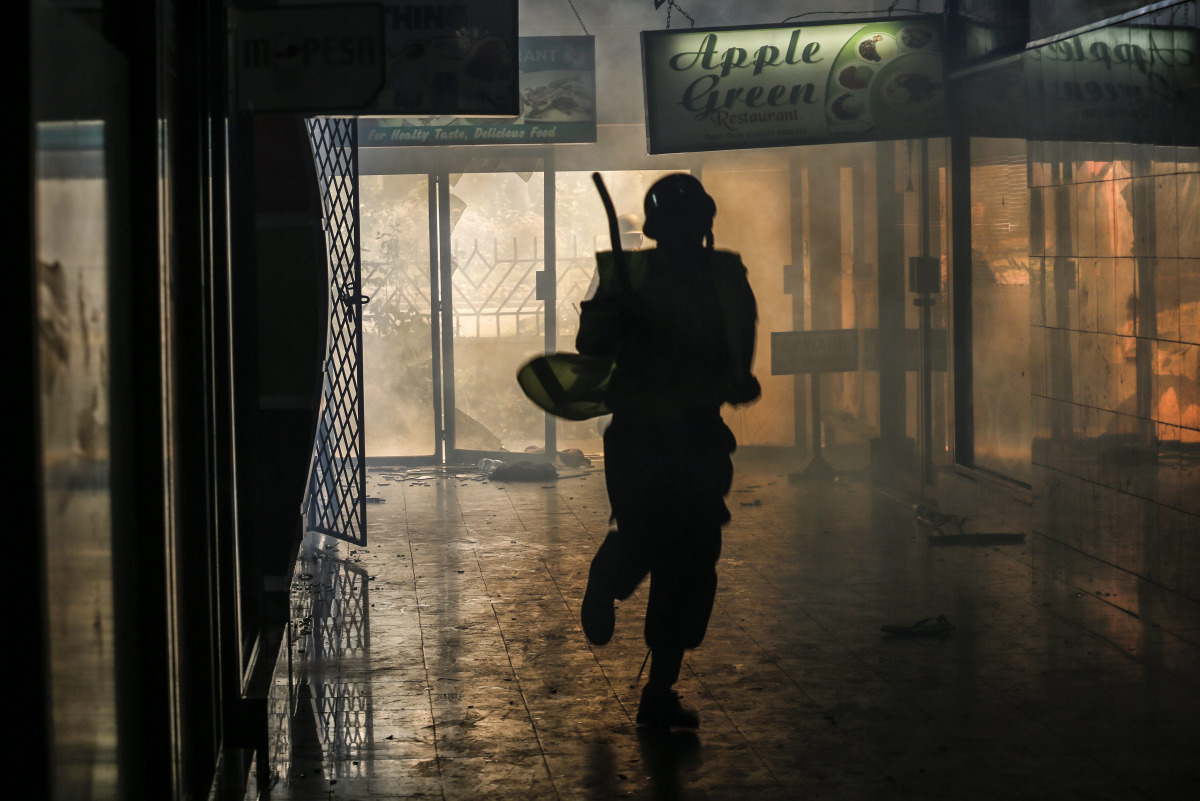 REPRESENTATIVE IMAGE: A riot police officer runs after the supporters of the opposition were dispersed with tear gas in downtown Nairobi, Kenya, May 16 2016 (EPA) 