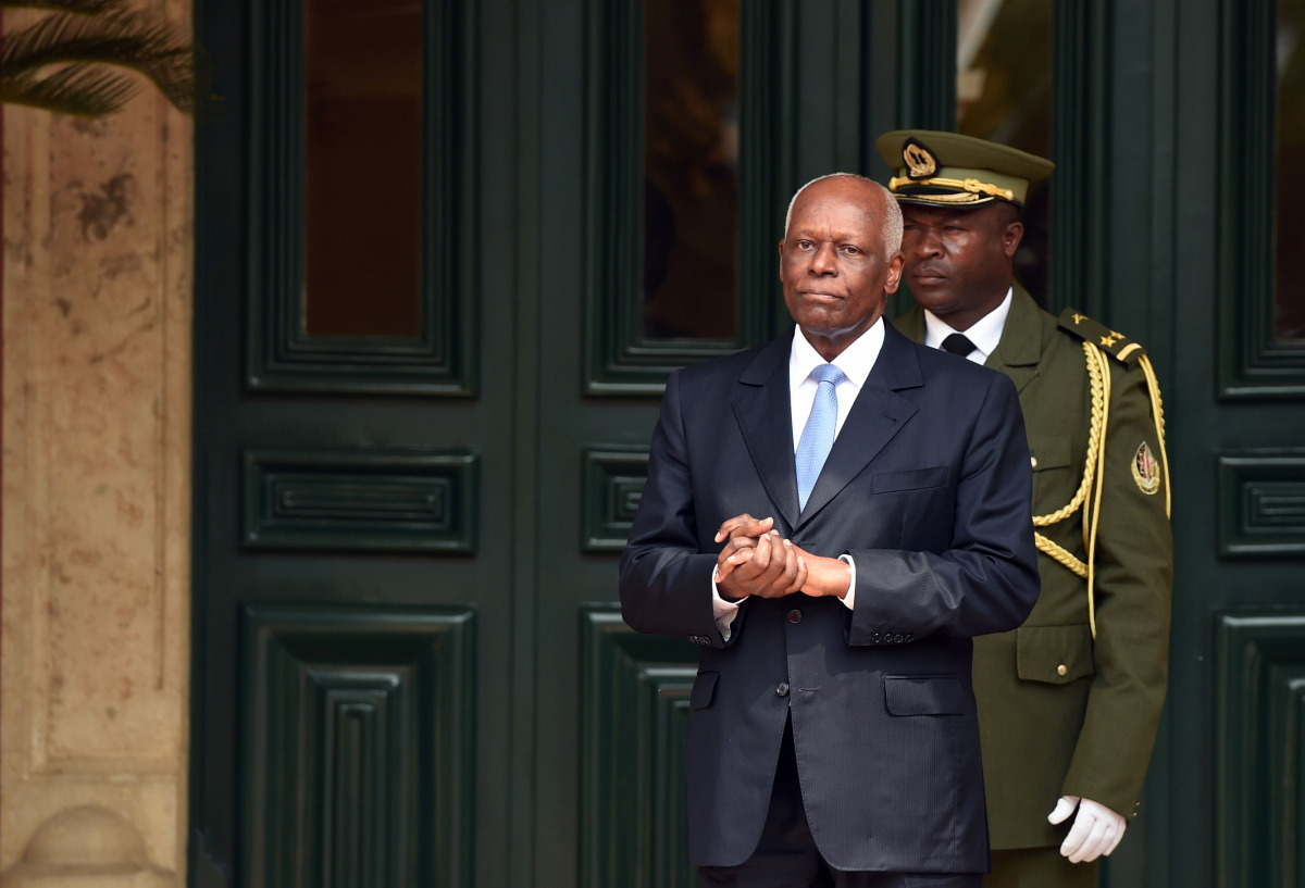 This July 3 2015 photo shows Angola President Jose Eduardo Dos Santos waiting for the arrival of his French counterpart at the presidential palace on July 3 2015 in Luanda (AFP / Alain Jocard) 