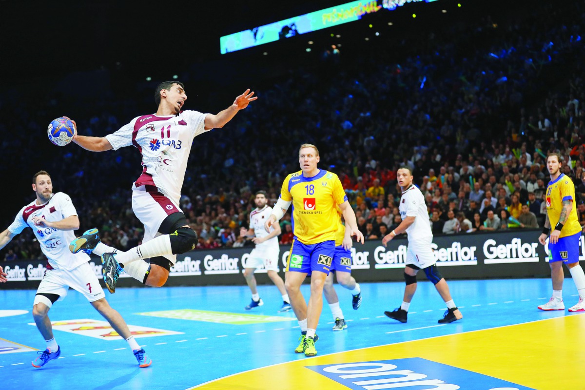 Qatar's left wing Murad Abdulrazzaq (Second left) jumps to shoot at the goal during their 25th IHF Men's World Championship 2017 Group D handball match against Sweden at the AccorHotels Arena in Paris on Wednesday. Sweden won 36-25.