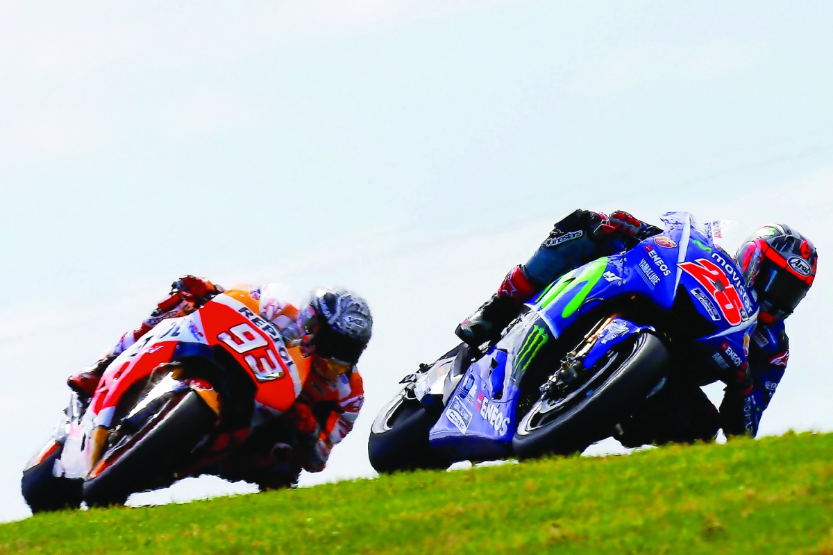 Yamaha Racing Team rider Maverick Vinales (right) is closely followed by Repsol Honda Team’s Marquez during the MotoGP Pre-season test at the Phillip Island Circuit. 