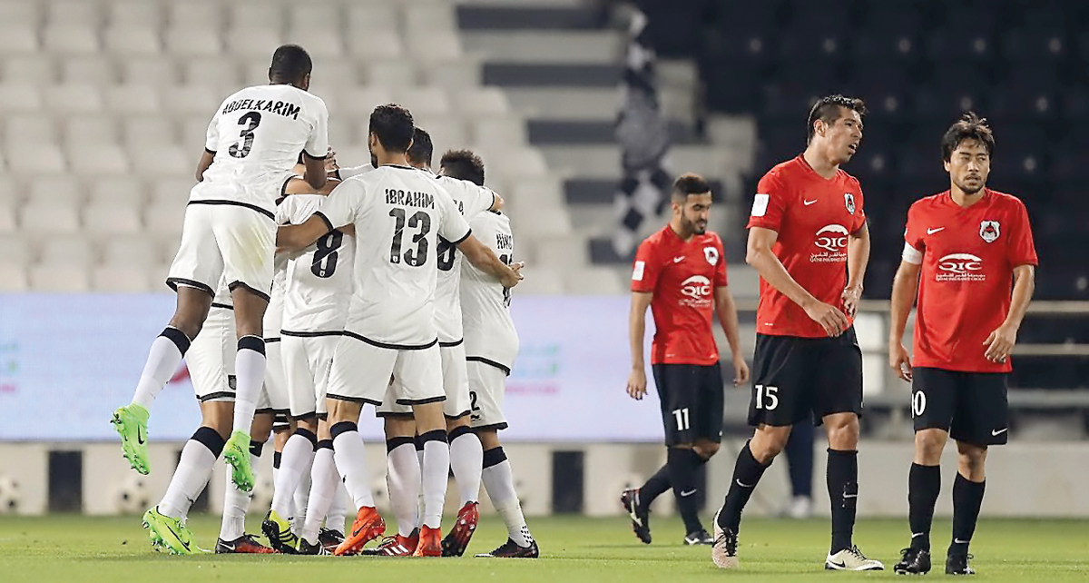 Al Rayyan skipper Rodrigo Tabata (right) and his team-mates look on while Al Sadd players celebrate after scoring a goal during their Qatar Stars League Round-25 match played at Al Sadd Stadium on Sunday. Al Rayyan will take on Al Arabi in their round 25 