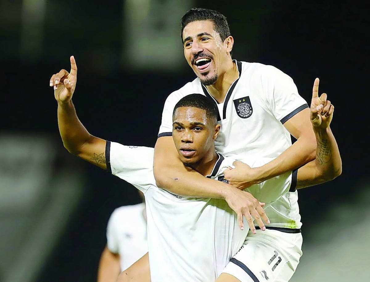 Al Sadd players celebrate after scoring a goal in this file photo.