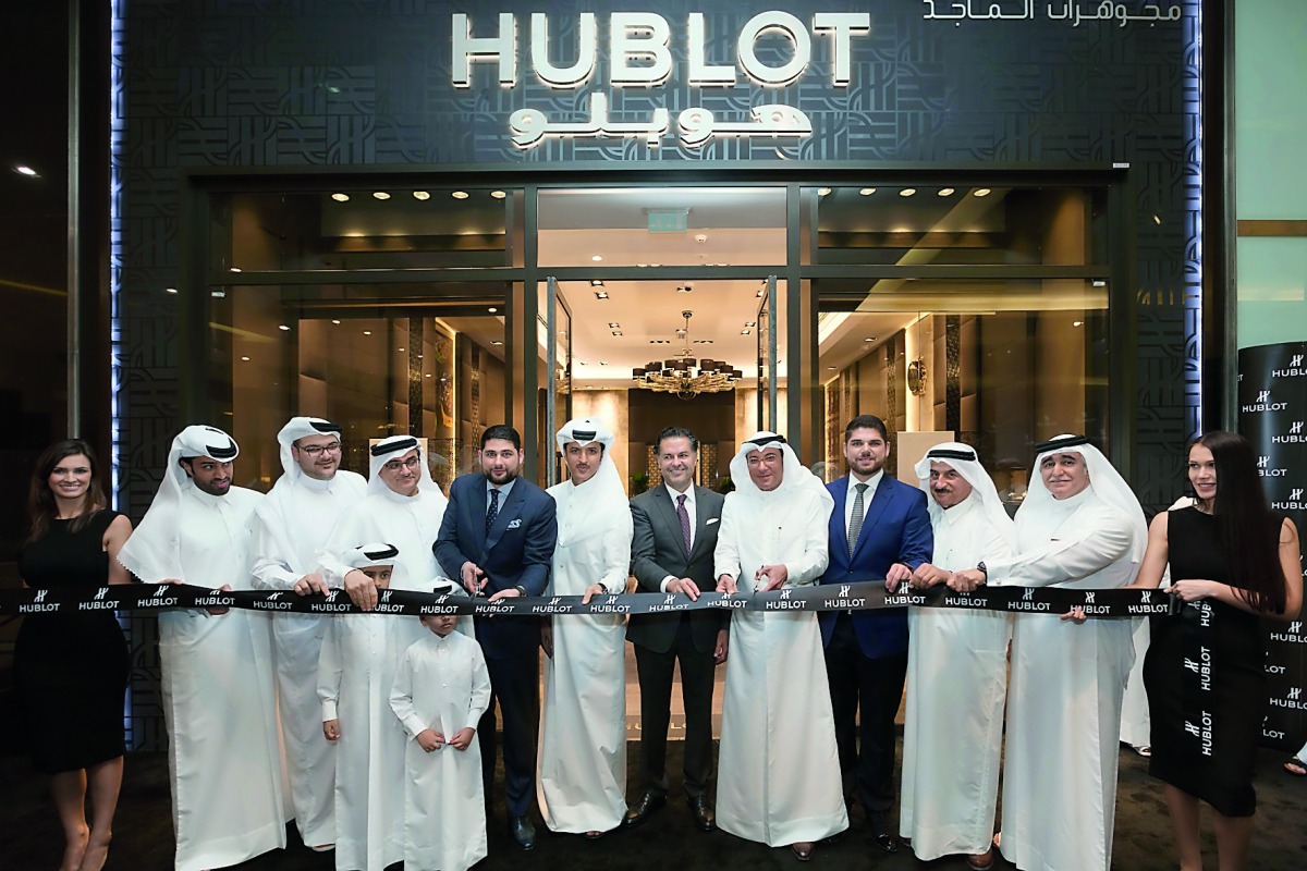 Marco Tedeschi, Regional Director of Hublot Middle East and Africa; Al Majed Chairman Ahmed Mahdi Al Majed and Al Majed Vice-President Jamil Mahdi Al Majed, with Arab Superstar Ragheb Alama at the inauguration of Hublot boutique in Doha’s Lagoona Mall. Ar