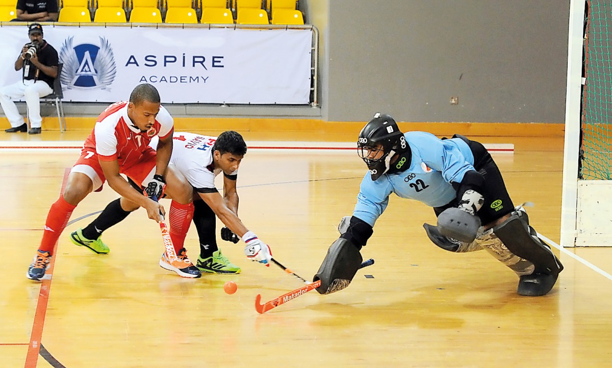 Action from the men's match of the Asia Cup 2017 Indoor Hockey Championship between Qatar and Oman at the Aspire Dome in Doha yesterday. (Picture by: Salim Matramkot/The Peninsula)