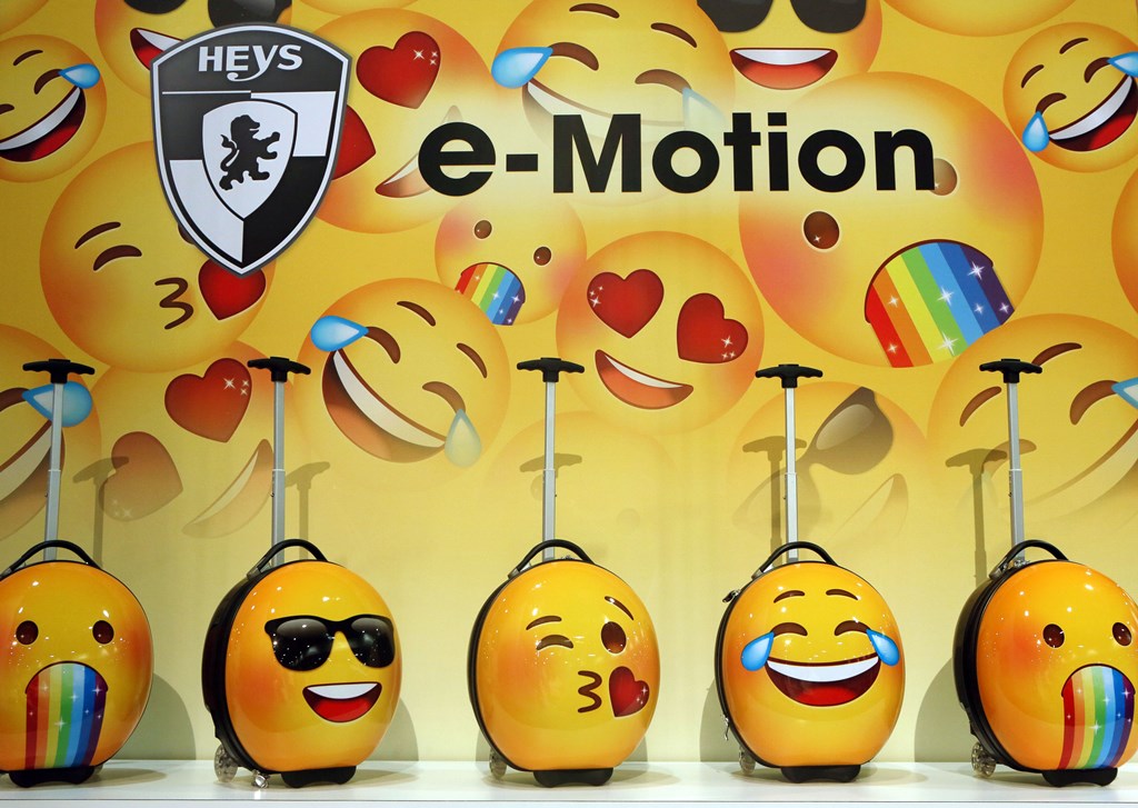 The Heys e-Motion Kids Collection line - featuring emoji - is at the front of a trend by makers to dress up hard-side luggage with bright colors and whimsical designs. All pictures by Ronda Churchill for The Washington Post.