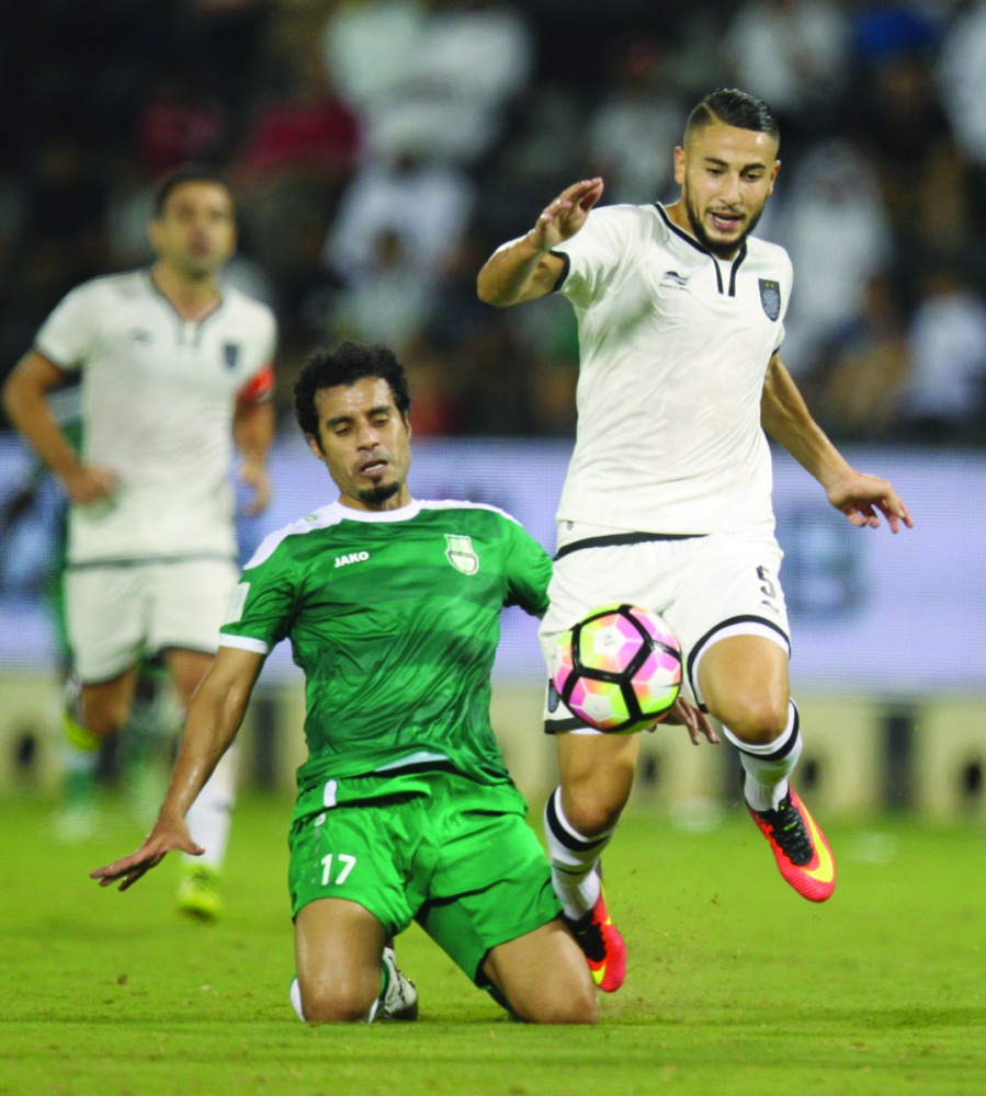 Al Sadd star Jugurtha Hamroun (extreme right)