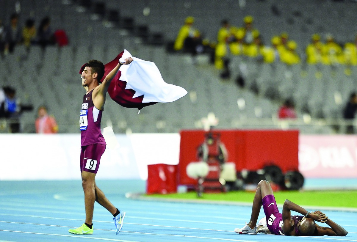 Qatari athlete Jamal Hairane celebrates after winning an event in this file photo