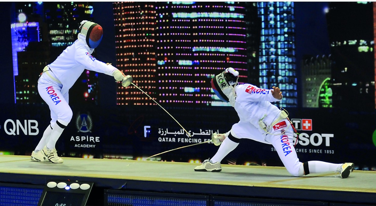 The reigning Olympic champion Park Sang-young (right) and  Jung Jinsun in action during the all-South Korean men’s final of the Qatar Fencing Grand Prix at the Aspire Dome yesterday. Pictures: Kammutty VP / The Peninsula