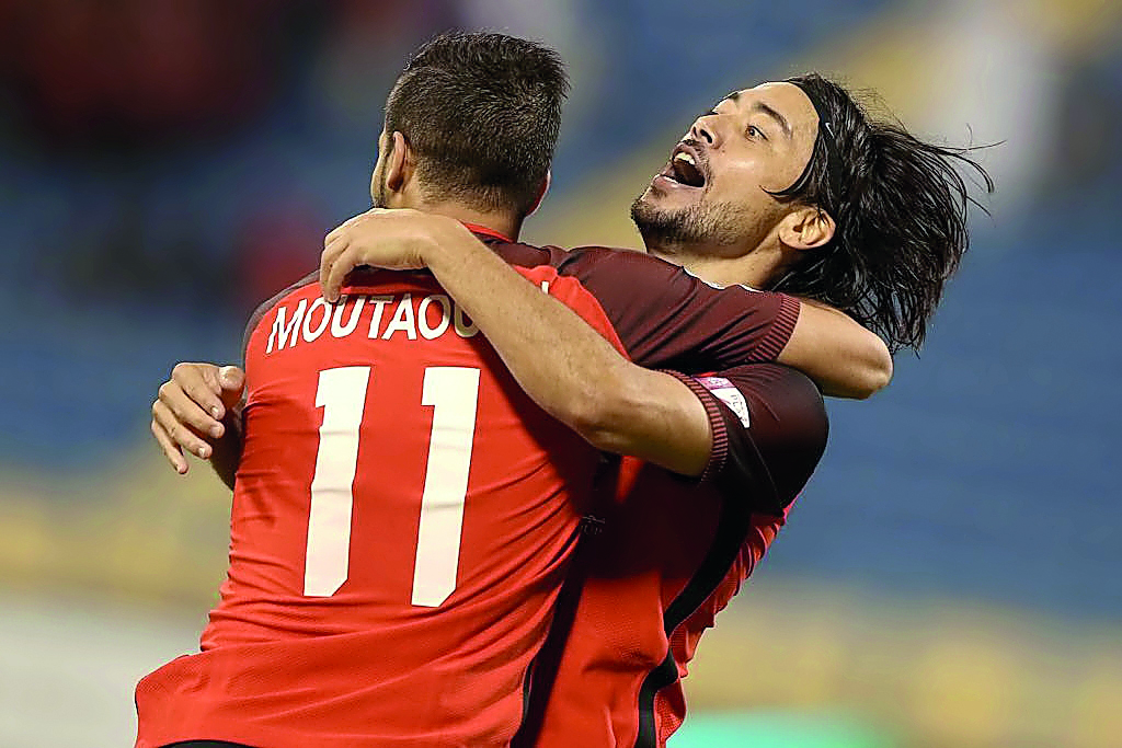 Al Rayyan’s star striker Rodrigo Tabata (right) celebrates with a team-mate after scoring a goal in this file photo.