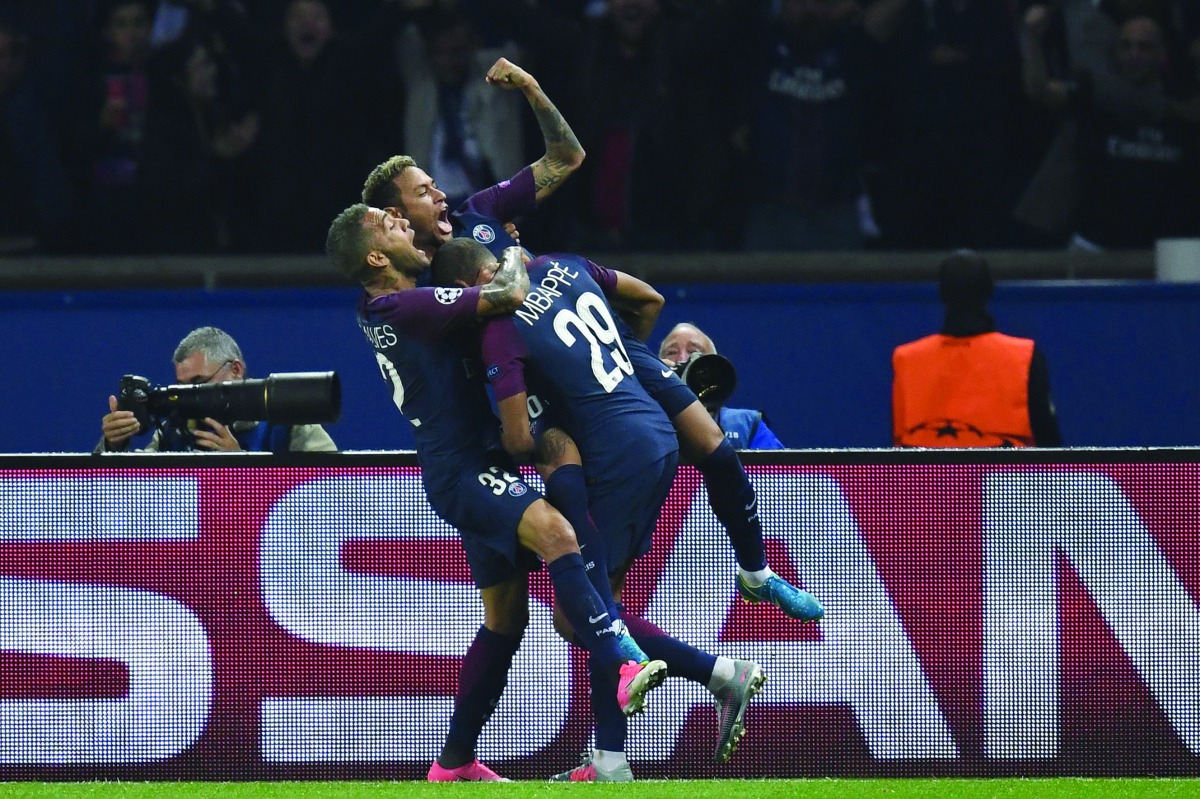 Paris Saint-Germain’s Neymar, Dani Alves and Kylian Mbappe.