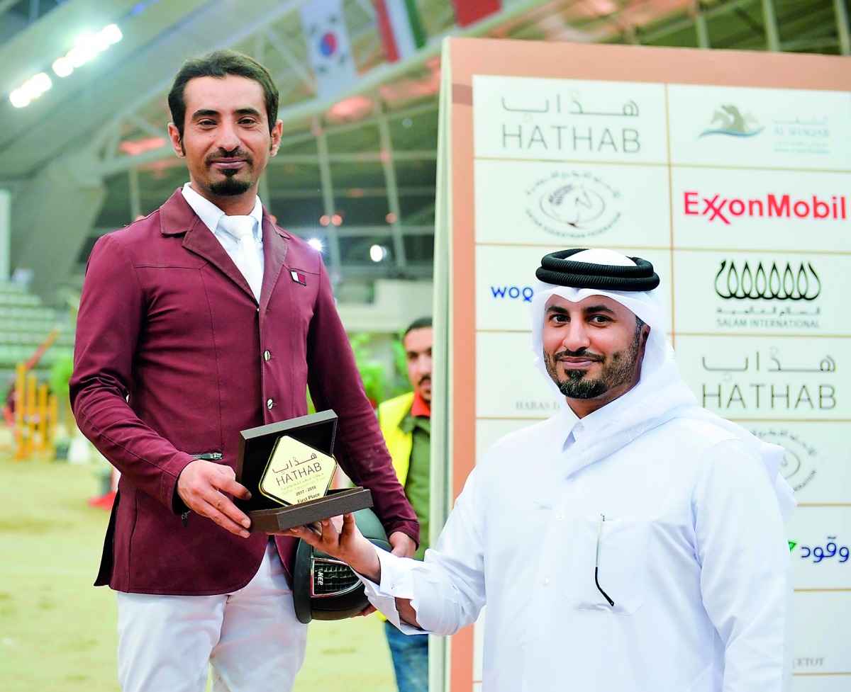 The winner of the Big Tour, Awad Al Qahtani receiving his trophy during the presentation ceremony at Al Shaqab Arena yesterday.