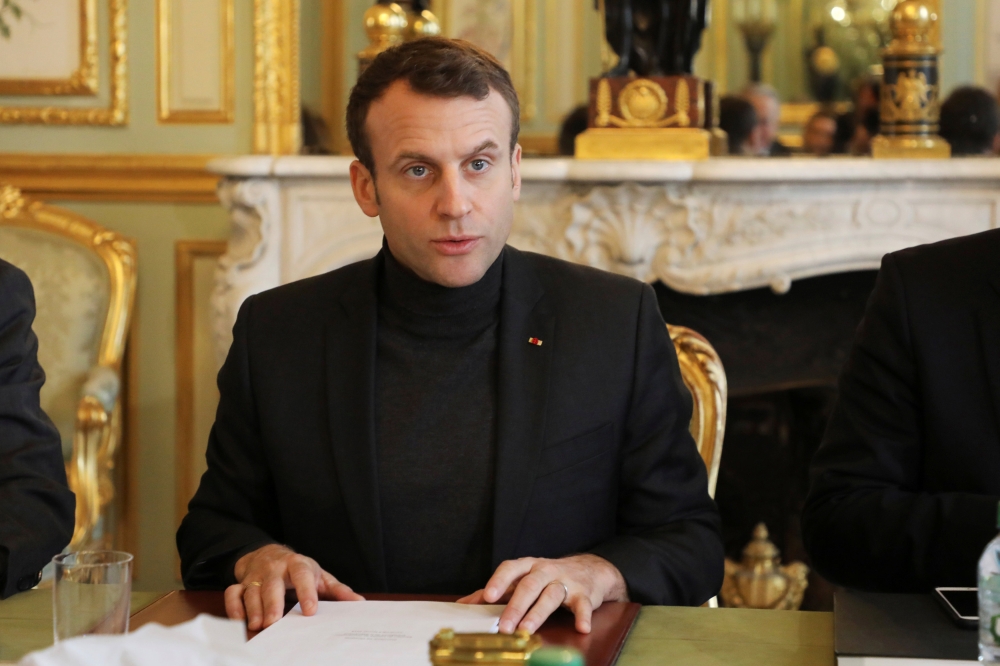 French President Emmanuel Macron speaks during a Trianon Council meeting (Conseil de coordination du dialogue de Trianon) aiming to strengthen the links between France and Russia at the Elysee Palace in Paris, France, Febuary 9, 2018. REUTERS/Ludovic Mari