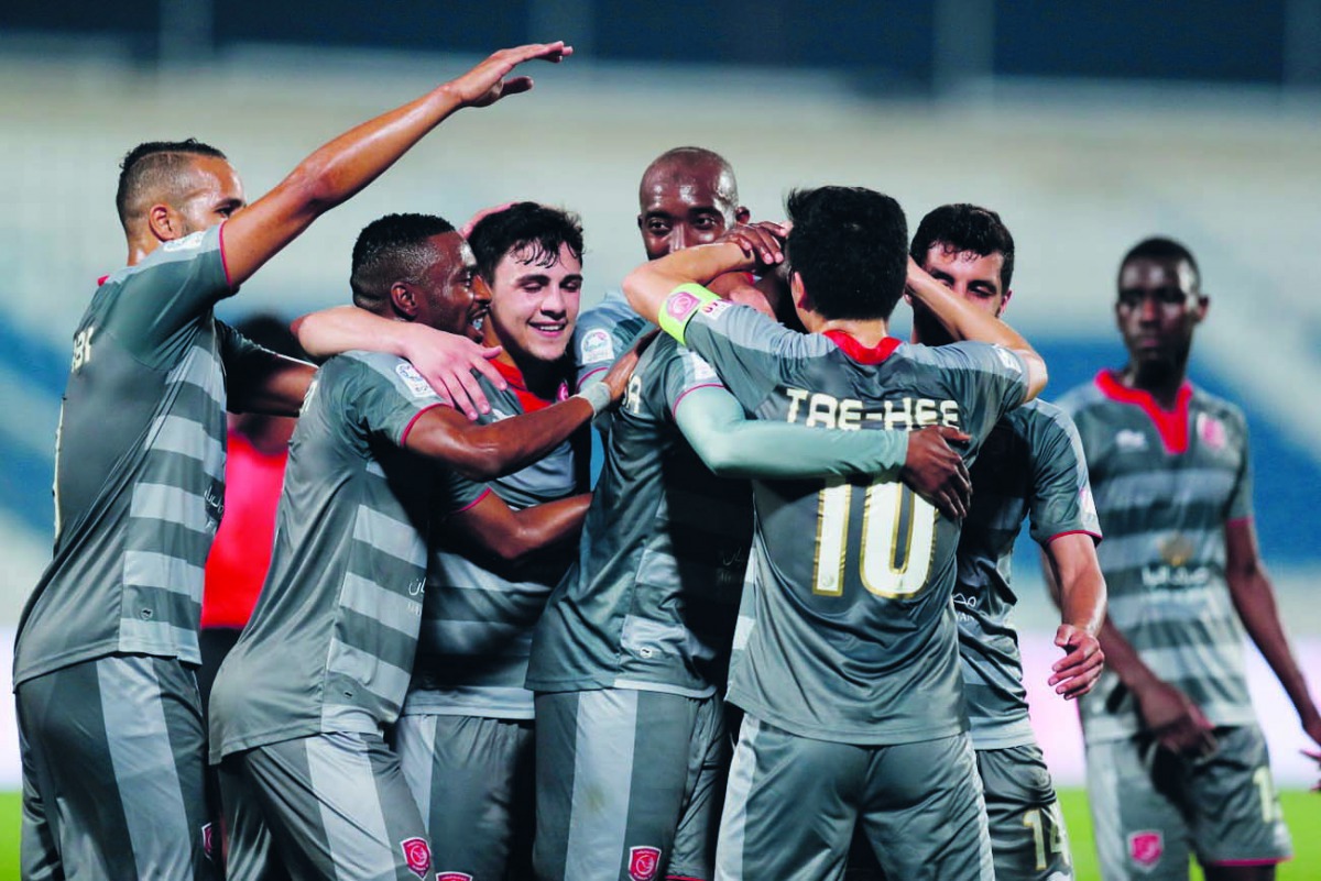 Players of Al Duhail celebrate a goal against Al Kharaitiyat in their QNB Stars League match in Doha yesterday.  Al Duhail won 5-0.