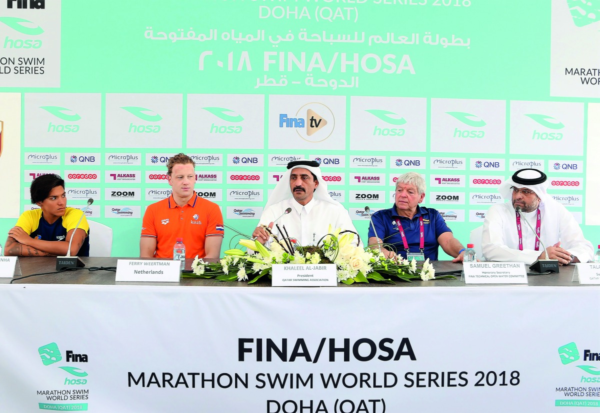 FROM LEFT: Ana Marcela of Brazil, Dutchman Ferry Weertman, President of the Qatar Swimming Association (QSA) Khaleel Al Jabir, FINA representative Samuel Greetman and Secretary General of QSA Talal Mubarak during a press conference yesterday.  Picture: Ka