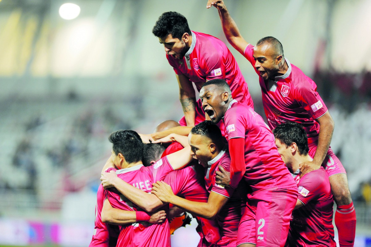 Al Duhail players celebrate after scoring against Al Duhail during their QNB Stars League match against Al Rayyan in this file photo.