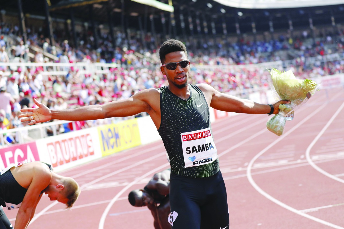 Abderrahman Samba of Qatar celebrates after winning the 400m hurdles  yesterday. 