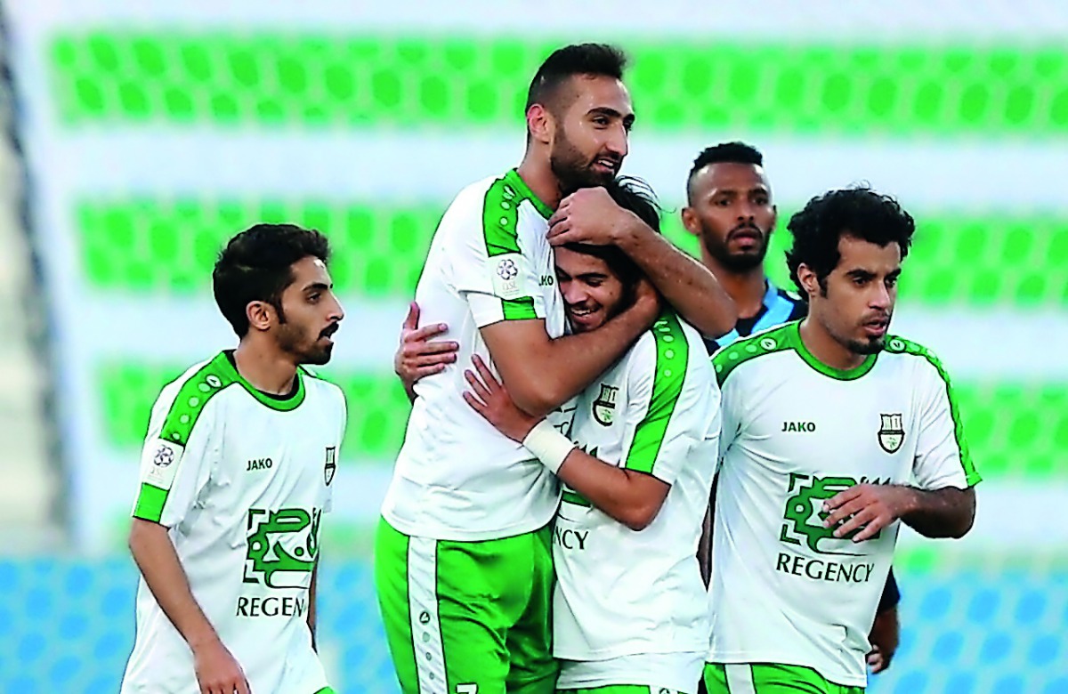 Al Ahli players celebrate after scoring during a QNB Stars League match in this file photo.