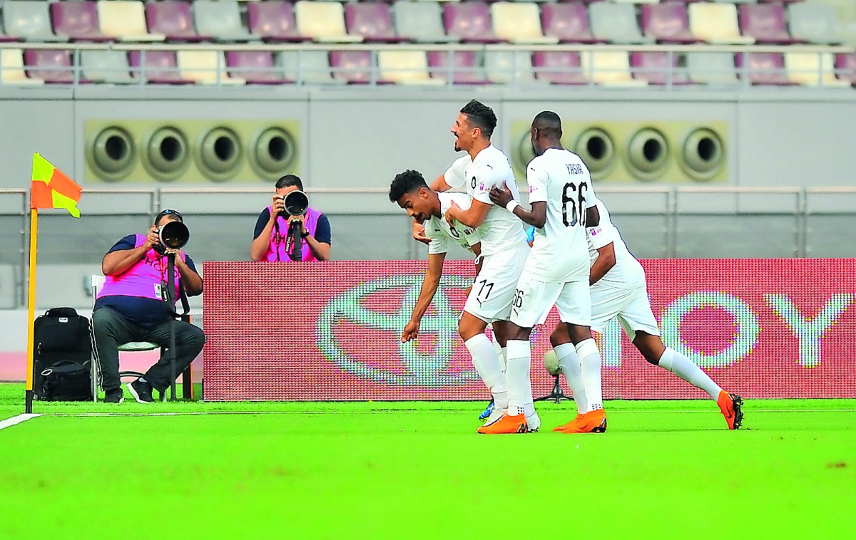 Al Sadd’s players celebrate after scoring against Al Kharaitiyat during their opening match of the QNB Stars League played at the Khalifa International Stadium in Doha  on Sunday. 