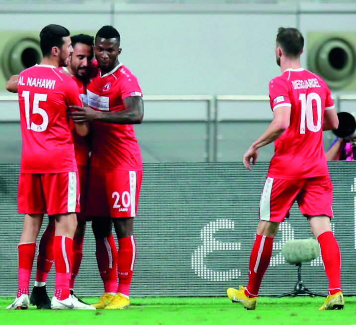 Al Arabi players  celebrate scoring a goal against Al Kharaitiyat during their QNB Stars league match in Doha yesterday.