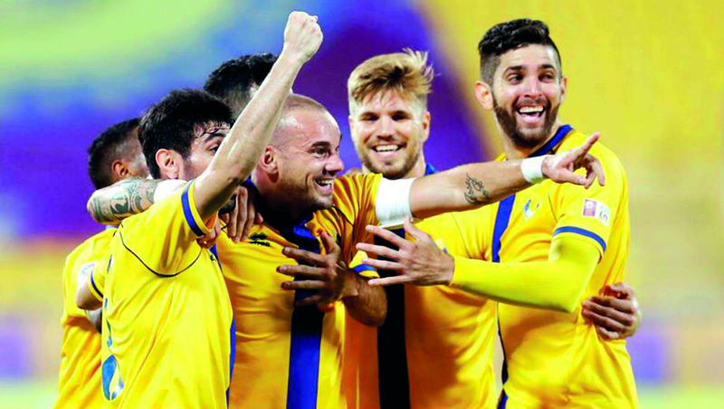 Al Gharafa players celebrate after scoring in a QNB Stars League match in this file photo.