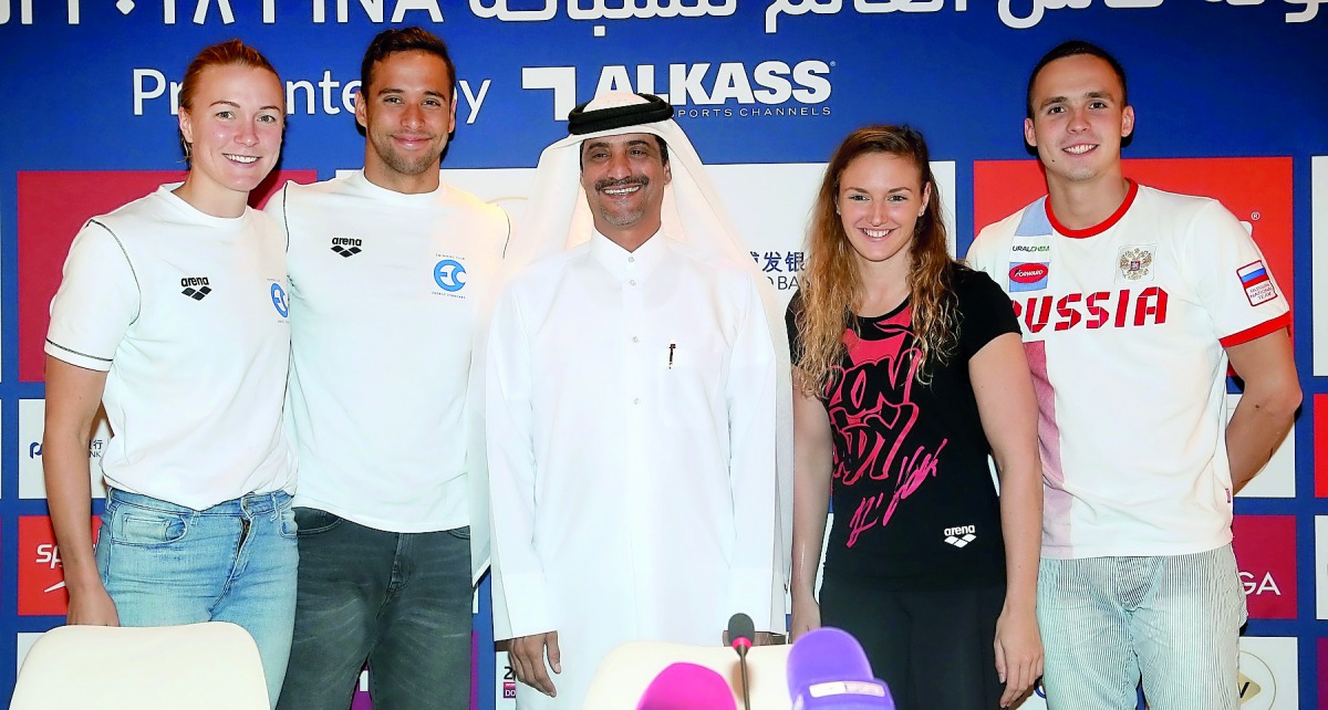 FROM LEFT: Swedish swimmer Sarah Sjostrom, South Africa’s Chad Le Clos, Qatar Swimming Association (QSA) President Khaleel Al Jabir, Hungaria’s Katinka Hosszu and Russia’s Vladimir Morozov pose for a photograph during a press conference held in Doha yeste