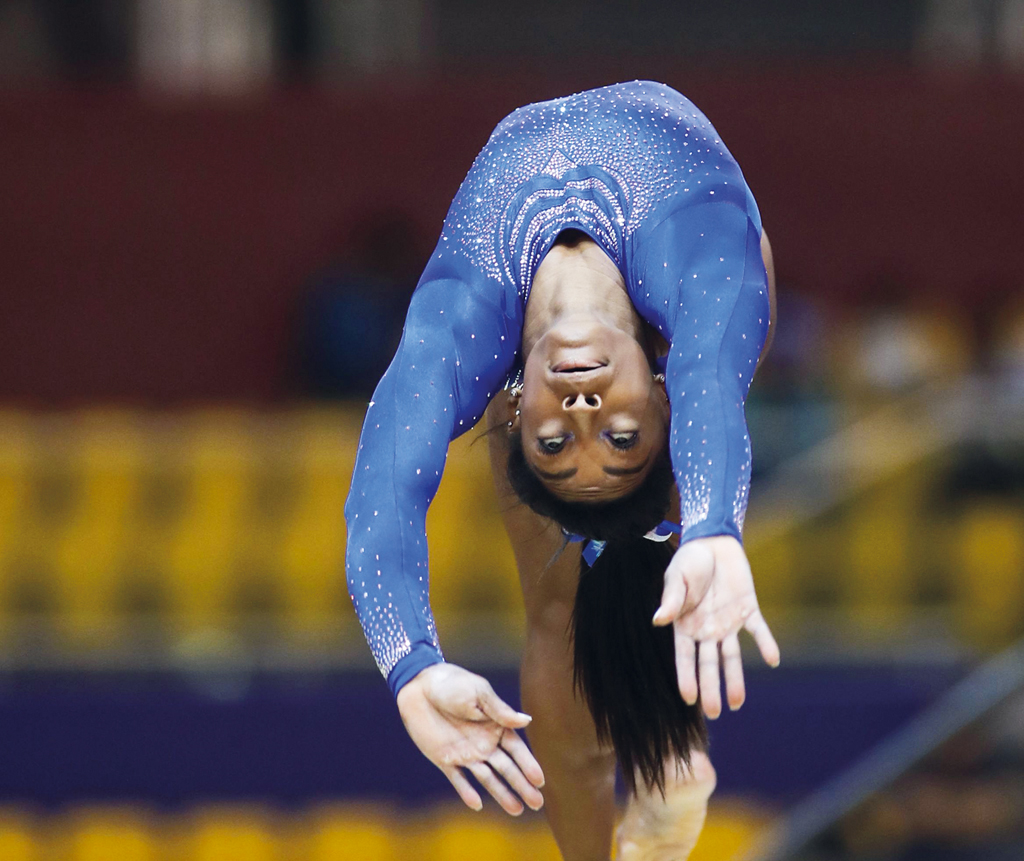 Simone Biles competes in the women’s balance beam  at Aspire Dome, yesterday. Pictures: Syed Omar 