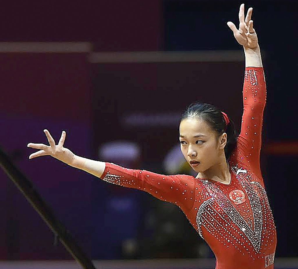 China’s Zhang Jin during floor qualifying yesterday. Picture: Syed Omar