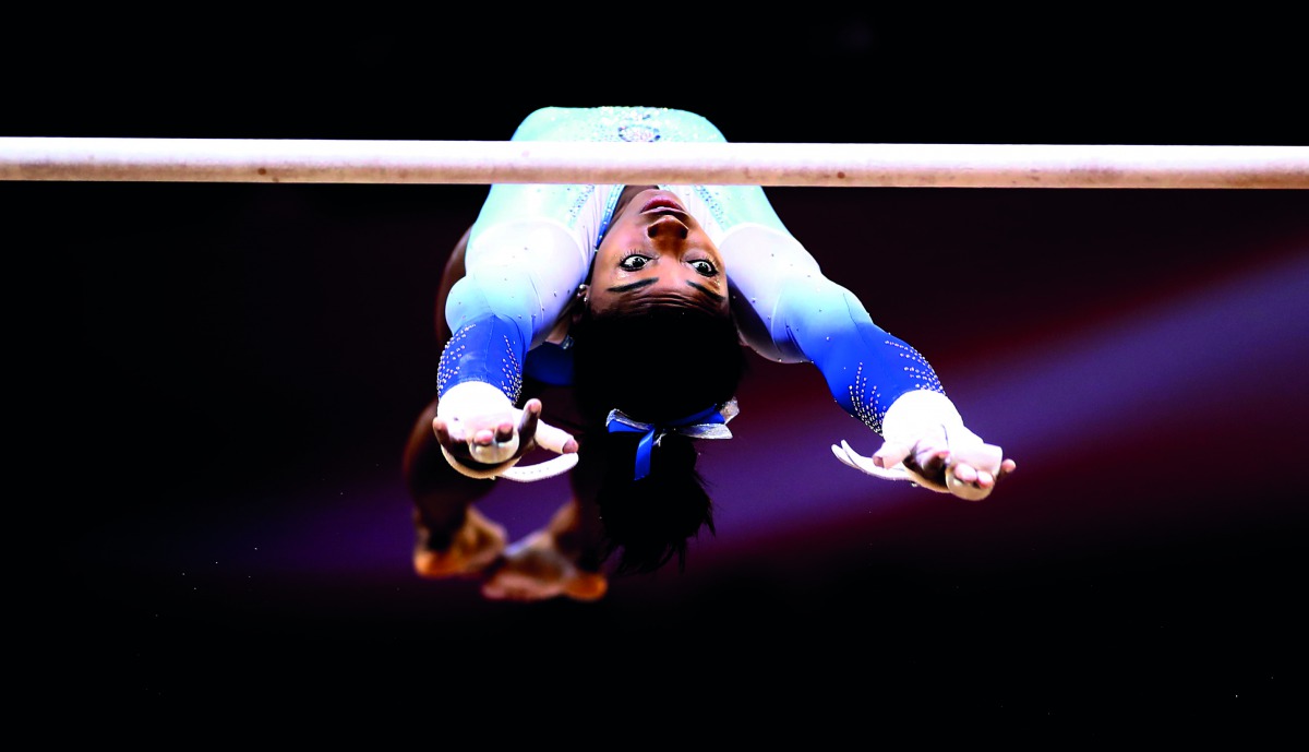 Simone Biles of the United States competes on the uneven bars during day nine of the 2018 FIG Artistic Gymnastics Championships at the Aspire Dome in Doha yesterday.