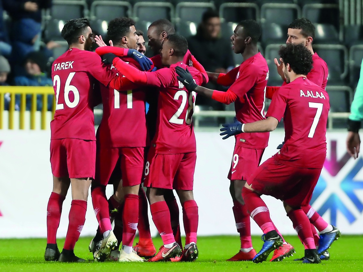 Qatari players celebrate after scoring against Iceland during their friendly match which wa played in Eupen, Belgium on Monday. 