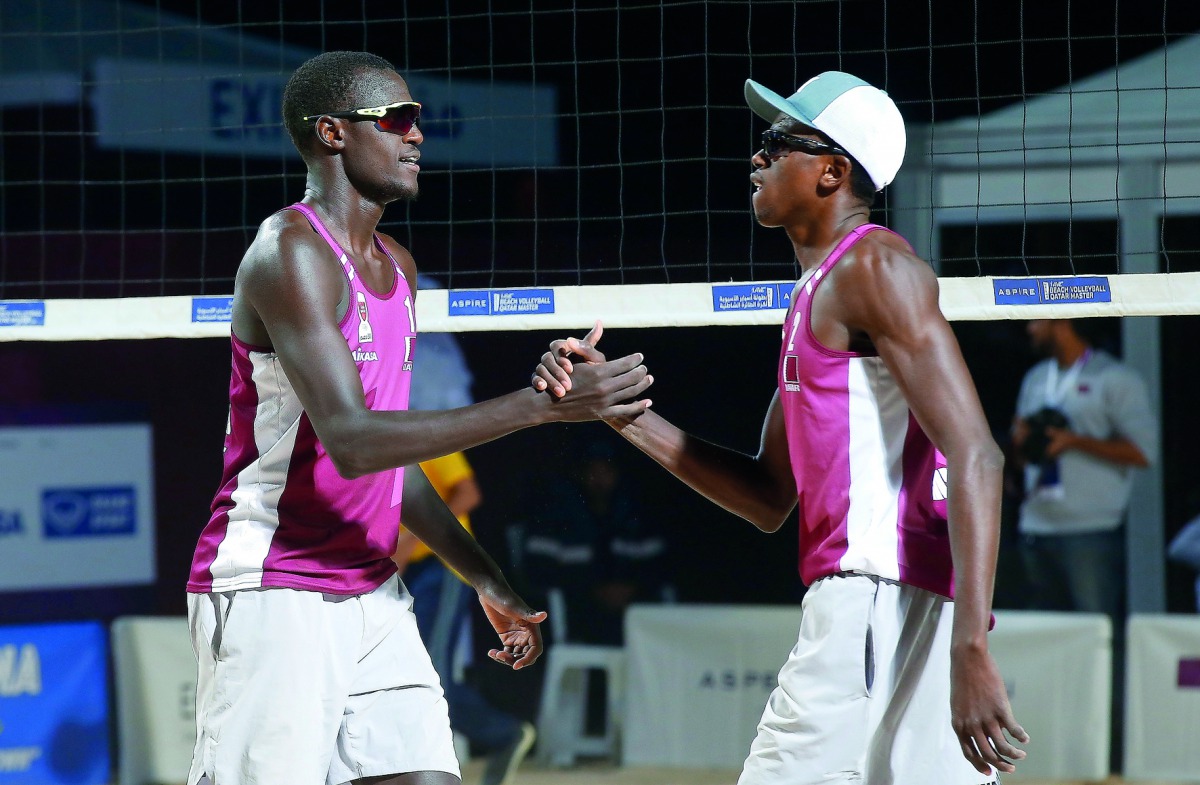 Cherif Younousse (left) and Ahmed Tijan Janko celebrate after scoring during their quarter-final match yesterday.