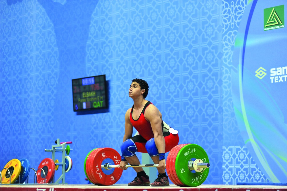 Qatari weightlifting star Fares Ibrahim Hassouna prepares for a lift in this file photo.