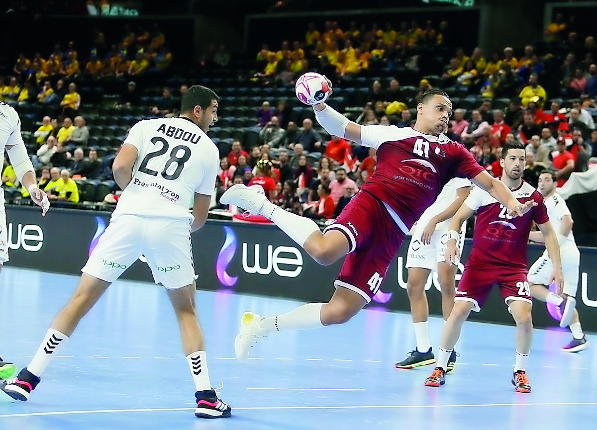 Qatar’s Youssef Ali prepares to score during the IHF Men’s World Championship Group D match against Egypt at the Royal Arena in Copenhagen, yesterday.